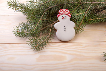 Christmas cookies with festive decoration on the wood background