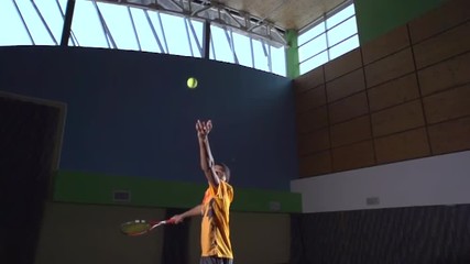 Tennis shots: Serve (slow motion).Professional tennis player.