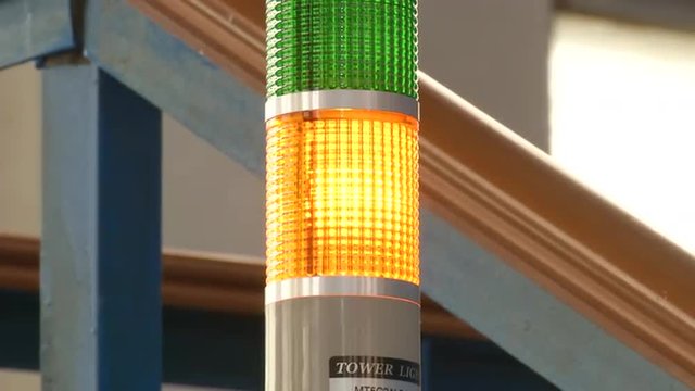 Blinking lamp of cubic-presser at synthetic diamonds factory.Synthetic diamond also known as cultured diamond or cultivated diamond