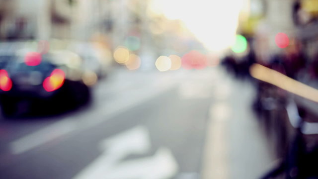 representation of urban context with out of focus and blurred background, traffic and people in citylife