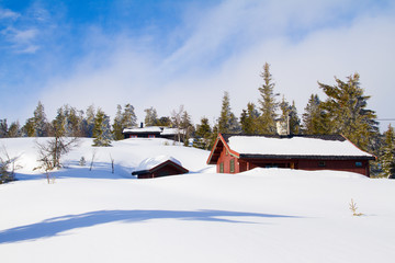 Winterlandschaft und Skih&uuml;tten