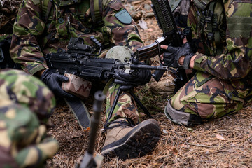Mashine gun in hands of British soldier