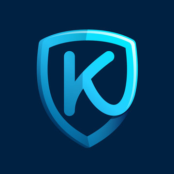 K letter with blue shield.