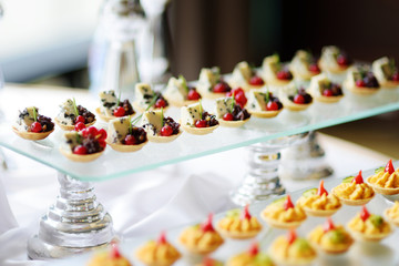 Plates with assorted snacks on an event party