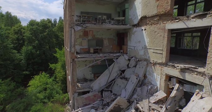 Collapsed school No1 of Pripyat town near Chernobyl, Ukraine. Aerial view.