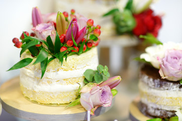 White wedding cake decorated with flowers