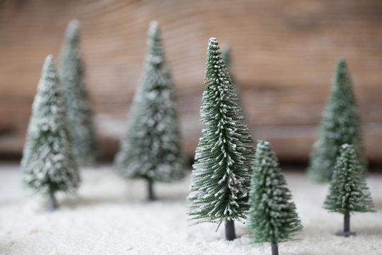 Christmas card - a miniature Christmas tree in the snow - winter