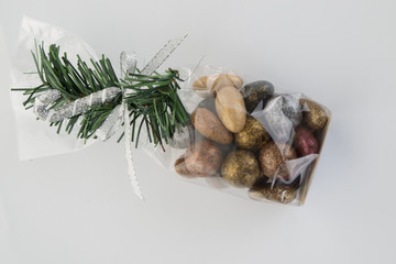 Stone shaped chocolates isolated on white