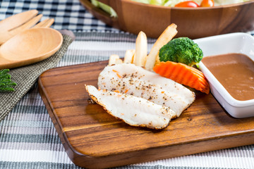 Grilled fish steak set with Cesar Salad