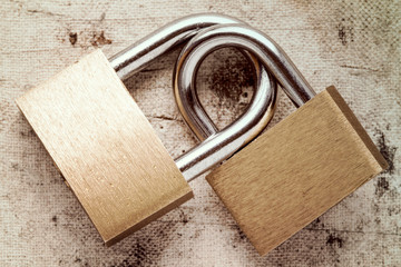 Two linked padlocks
