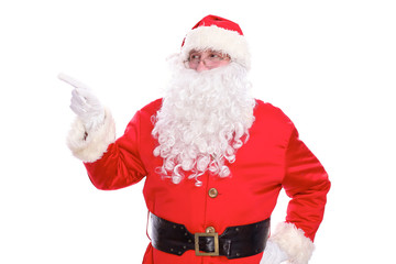 Kind Santa Claus pointing in white blank sign, isolated on white background