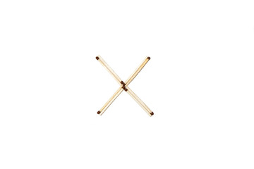 letter X made of safety match
