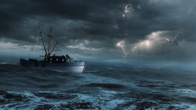 Fishing boat in the stormy open sea