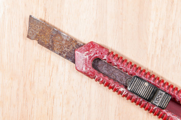 old cutter on wooden texture