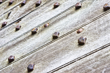 Studded wooden surface