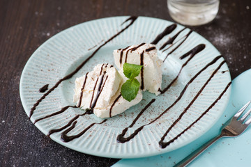 Cottage cheese poured with chocolate topping for breakfast