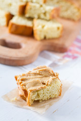 Corn bread cut in peaces on white wood background