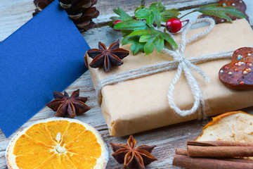 Christmas gift box and empty greeting card 