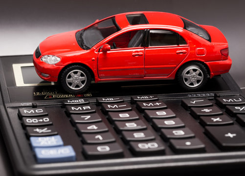 red car with black calculator
