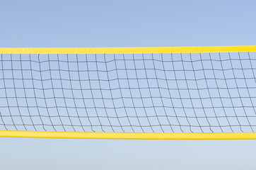 A beach volleyball net on blue sky