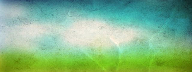 Conceptual green grass and sky old paper