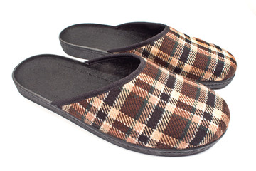 Brown house slippers isolated on white