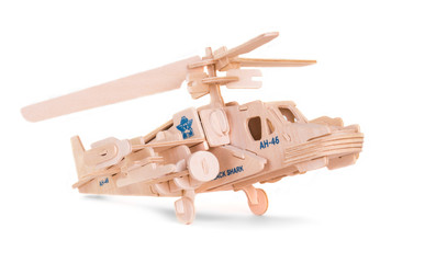 wooden model of a helicopter on a white background