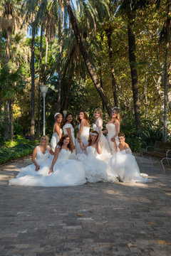 Women wearing wedding dress posing on a photo session