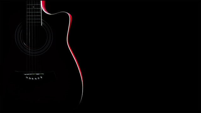 Guitar silhouette in the dark
