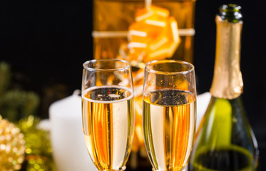 Glasses of Champagne with Gifts and Candles