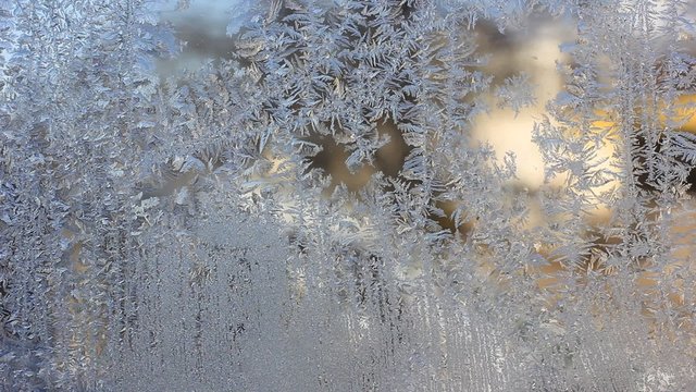 frozen window with city background