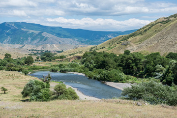 Fototapeta na wymiar Kura River seen from road to Vardzia cave monastery in Samtskhe-Javakheti region, Georgia