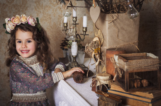 Small beautiful girl dressed in retro style