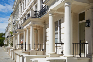 White luxury houses facades in London, perspective view