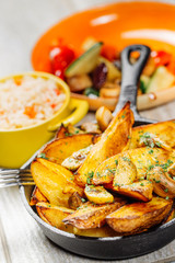 Fried potato with mushrooms and herbs