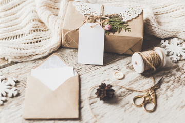  Cute vintage christmas new year gifts mock up on wooden background.