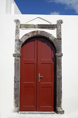 colorful door in oia village on santorini island