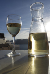 vine glass in the sky on greek island