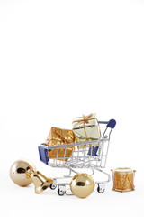 Shopping cart with colorful gift boxes isolated on white backgro