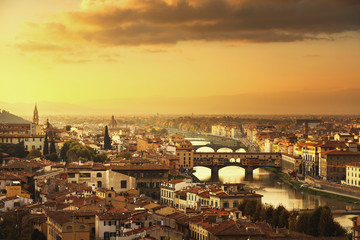 Fototapeta na wymiar Florence or Firenze sunset Ponte Vecchio bridge panoramic view.T