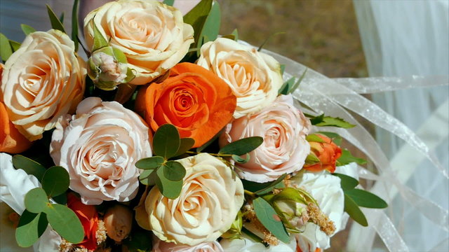 Beautiful wedding bouquet in hands of bride