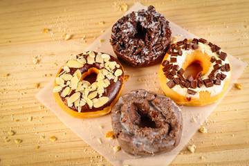 Donuts on wooden background