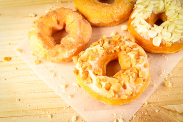 Donuts on wooden background