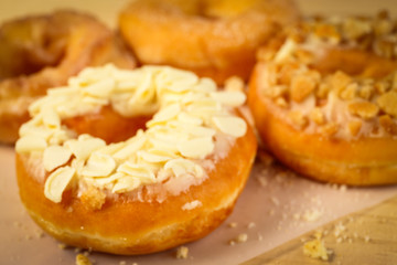 Donuts on wooden background
