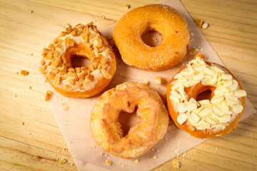 Donuts on wooden background