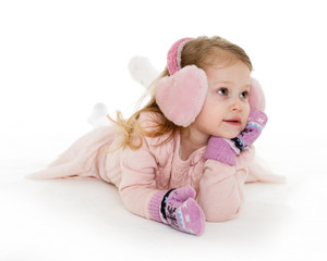 Little girl in winter clothes.