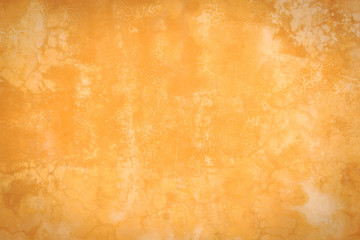 Abstract old orange cement wall with crack texture