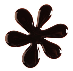 Silhouette of drawn chocolate flower, isolated on white