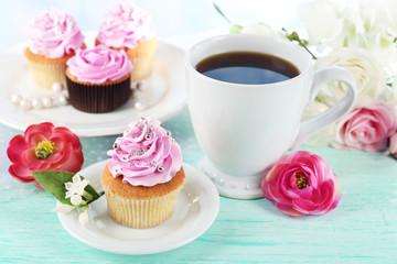 Tasty cupcakes on tray, on light background