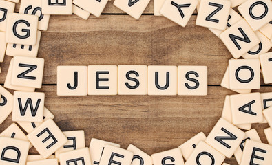 Jesus spelled out in tan tile letters